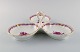 Herend Chinese Bouquet Raspberry. Three-part serving dish with handle in 
hand-painted porcelain. Pink flowers and gold decoration. Mid-20th century.
