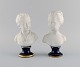 Limoges France. Two child busts in biscuit. Stand with dark blue glaze and gold 
edges. Classic style. Early 20th century.
