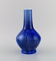 Paul Proschowsky (1893-1968) for Royal Copenhagen. Unique porcelain vase. 
Beautiful crystal glaze in shades of blue. Dated 1924.
