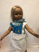 Retro
Model child
H: 77cm
Very lifelike, and with a long hair
Incl. dress
It stands by itself by the foot 
In a very good condition