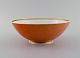Royal Copenhagen Jægersborg porcelain bowl. Orange with gold decoration. 1920s.
