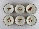 Catherine McClung for Lenox. "Winter greetings everyday". Six bowls in glazed 
stoneware decorated with mistletoe, birds and red ribbon. Approx. 2000.
