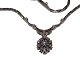 14 carat white gold necklace with pendant containing 16 diamonds