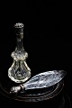 2 antique perfume bottles in glass with silver top...