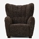Roxy Klassik presents: Danish CabinetmakerUpholstered easy chair with new lambskin (colour: Sahara) with ...