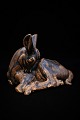 Saxbo ceramic figure of a reclining deer with fine brown glaze.
Design Hugo Liisberg...