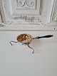 Karstens Antik presents: Antique tea strainer in silver with wooden handle