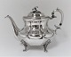 Lundin Antique presents: Russian silver teapot (84). Stamped AK. Produced 1852. Length 20 cm.