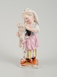 Meissen similar stamp, girl with lamb, late 19th century.