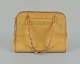Chanel calfskin bag in yellow Italian calfskin.
1970/80s.