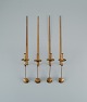 Skultuna, Sweden, four brass candlesticks for wall hanging.
Designer by Pierre Forsell.