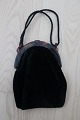 Vintage:
Beautiful little old handbag
Black fabric inside and outside
Beautiful closing item 
About 1920