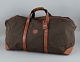 Longchamp, large travel bag in canvas and grain leather.