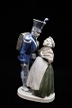 Royal Copenhagen porcelain figure of a soldier with an elderly woman... 
RC 1112.
