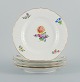 Royal Copenhagen Saxon Flower. Five dinner plates in hand-painted porcelain with 
flowers and gold decoration.