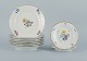 Royal Copenhagen, Saxon flower, nine plates consisting of seven lunch plates and 
two smaller plates.