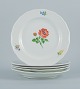 Meissen, Germany.
Five porcelain dinner plates decorated with flowers.
