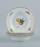 Royal Copenhagen Let Saksisk Blomst. Fire dybe tallerkener i håndmalet porcelæn.