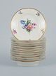 B&G, Bing & Grondahl Saxon flower.
12 cake plates decorated with flowers and gold trim.