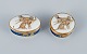 Porcelaine de Paris (Décor - Chasses Royales).
Two small lidded boxes with brass inserts hand-decorated with cheetahs and gold 
decoration.