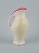 Pol Chambost (1906-1983) stil, keramikkande i mat hvid glassur.
Indvendigt dekoreret i rosa glassur.