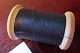 An old item for the sewing thread in, as in the 
old times
Beautiful and practical made of wood
L: about 5cm
Cotton thread Mad in Great Britain