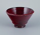 Solveig og Lars Henrik Kähler, ceramic bowl with glaze in burgundy tones.