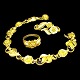 Georg Jensen; A jewelry set in 18k gold
