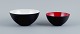 Two "krenits" bowls in metal.
White and red.