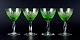 "Wien Antik", "Lyngby Glas", Denmark, four green white wine glasses.
