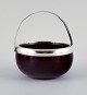 Danish sugar bowl in burgundy glass with silver mounting and handle.