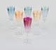 Seks franske champagnefløjter i krystalglas.