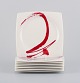 Paint It Red Collection - Red Vanilla, Royal Fine China, set of eight lunch 
plates in modern design with abstract motif.