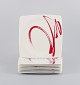 Paint It Red Collection - Red Vanilla, Royal Fine China, a set of eight dinner 
plates with modern design and abstract motif.