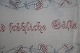 An old table cloth with embroidery, handmade
130cm x 30cm
Text: "Im Hause das Beste sind fröhliche Gäste" 
In a good condition