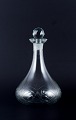 Danish glasswork, wine decanter in clear glass. Ball-shaped faceted stopper.