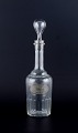 Danish glassworks, carafe for rum in clear mouth-blown facet-cut glass.