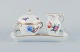 Royal Copenhagen, Saxon Flower, a sugar bowl and creamer on tray, hand-decorated 
with polychrome flowers and gold rim.
