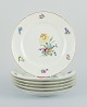 Bing & Grøndahl, Saxon Flower, a set of six dinner plates hand-decorated with 
polychrome flowers and gold rim.
