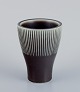 Carl Harry Stålhane for Rörstrand, a ceramic vase in a modernist style. 
Brown-toned glaze with white lines at the top.