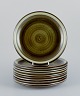 Marianne Westman for Rörstrand, "Maya", a set of ten plates with green-toned 
glaze.