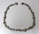 Lundin Antique presents: Georg Jensen. Silver necklace. Model 96A. Length 42 cm. Width 1 cm