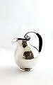 Lundin Antique presents: Danish silver jug (830). Height 17 cm. Produced 1934. Light traces of use.