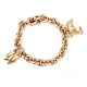 14kt gold anchor bracelet with two charms. L: 22cm. W: ...