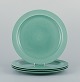 Royal Copenhagen, "4 All Seasons". A set of four dinner plates in faience with 
green glaze.
