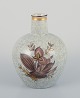 Royal Copenhagen, crackled porcelain vase with floral motif and gold decoration.
