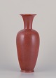 Gunnar Nylund for Rörstrand. Large ceramic vase in a classic form.
Glaze in light brown tones.