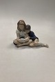 Royal Copenhagen Figurine of Sitting Boy and Girl No 4670