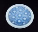 Sabino, France. A dish in art glass with raised flower motifs. Art Deco opaline 
glass with a bluish tint.