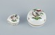 Herend, Hungary. Two porcelain lidded jars hand-painted with butterflies and 
birds on branches. Gold rim.